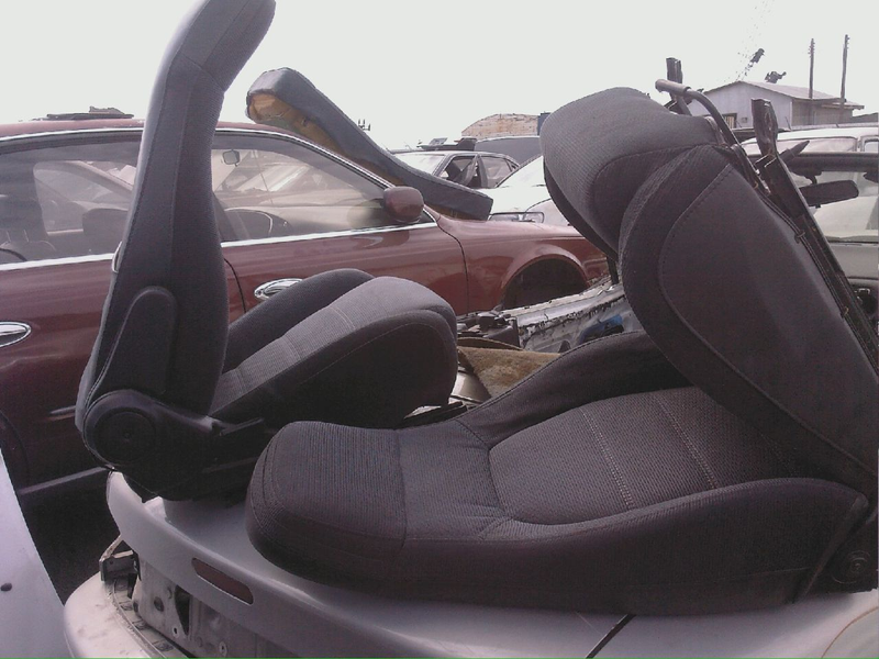 Illustration for article titled Super-Clean Miata Seats At The Junkyard... But There's A Catch
